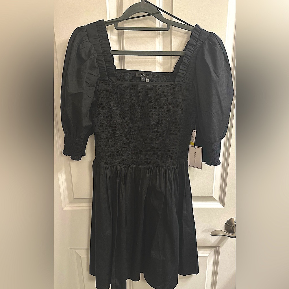 1.STATE Dress- Black with a smocked waist and puff sleeves.